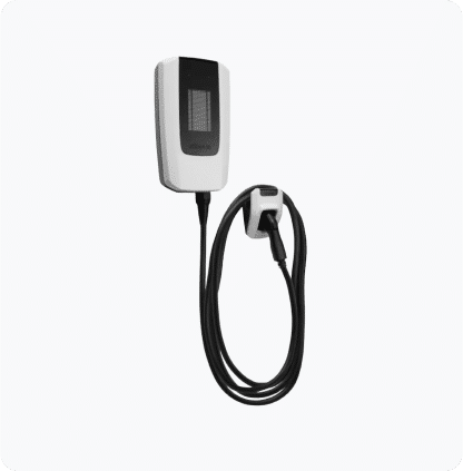 Wall-mounted electric vehicle charger with a coiled cable and connector.